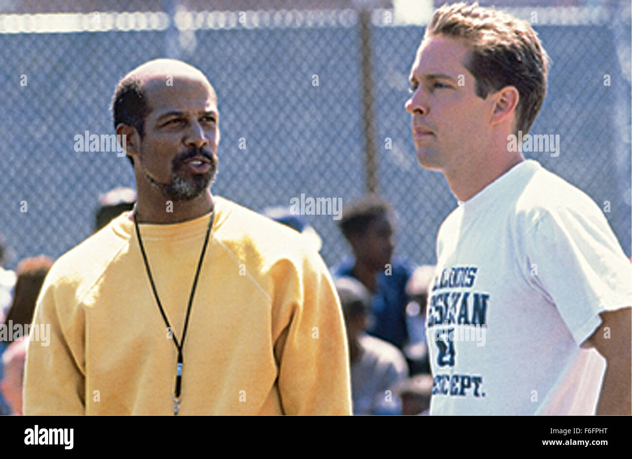 RELEASE DATE: October 4, 1991. MOVIE TITLE: Heaven Is a Playground - STUDIO: Heaven Corp. PLOT: A coach and a lawyer team up to provide incentives for an urban high school basketball team to stay out of trouble. PICTURED: MICHAEL WARREN as Byron Harper D.B. SWEENEY as Zack Telander.. Stock Photo