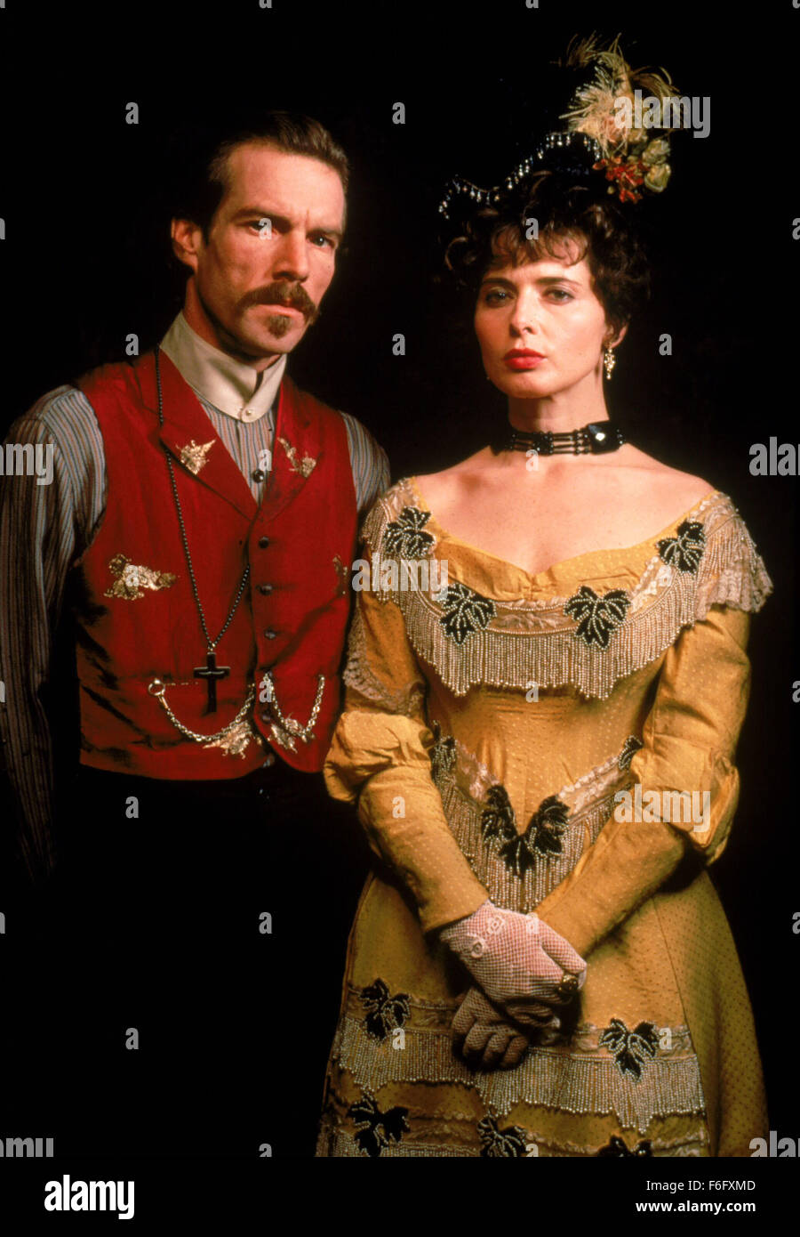 RELEASE DATE: June 1994. MOVIE TITLE: Wyatt Earp. STUDIO: Tig Productions. PLOT: Wyatt Earp is a movie about a man and his family. More of a documentary than Hollywood tinsel, this movie shows us the good times and the bad times of one of the West's greatest heros. PICTURED: DENNIS QUAID as Doc Holliday, ISABELLA ROSSELLINI as Big Nose Kate. Stock Photo