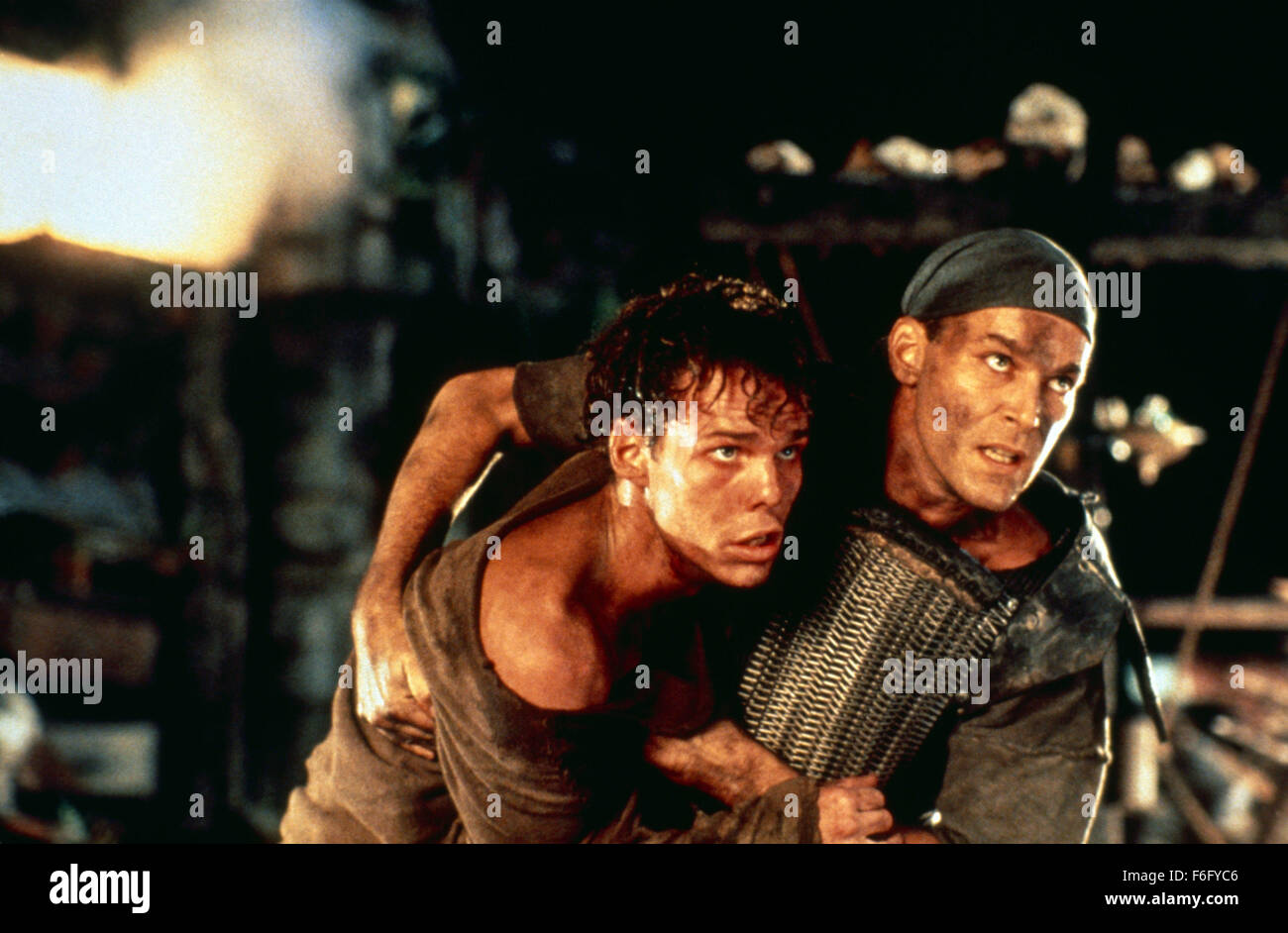 Apr 29, 1994; Queensland, Australia; KEVIN DILLON (left) as Casey and RAY LIOTTA as Capt. J. T. Robbins in the sci-fi action film ''No Escape'' directed by Martin Campbell. Stock Photo