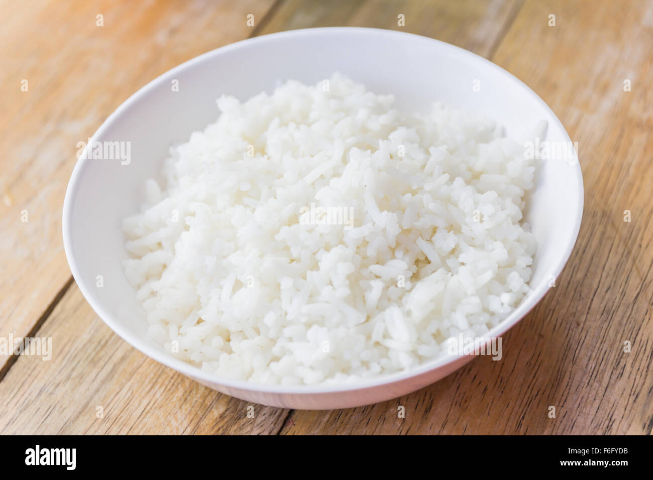 cooked rice in white cup. Stock Photo