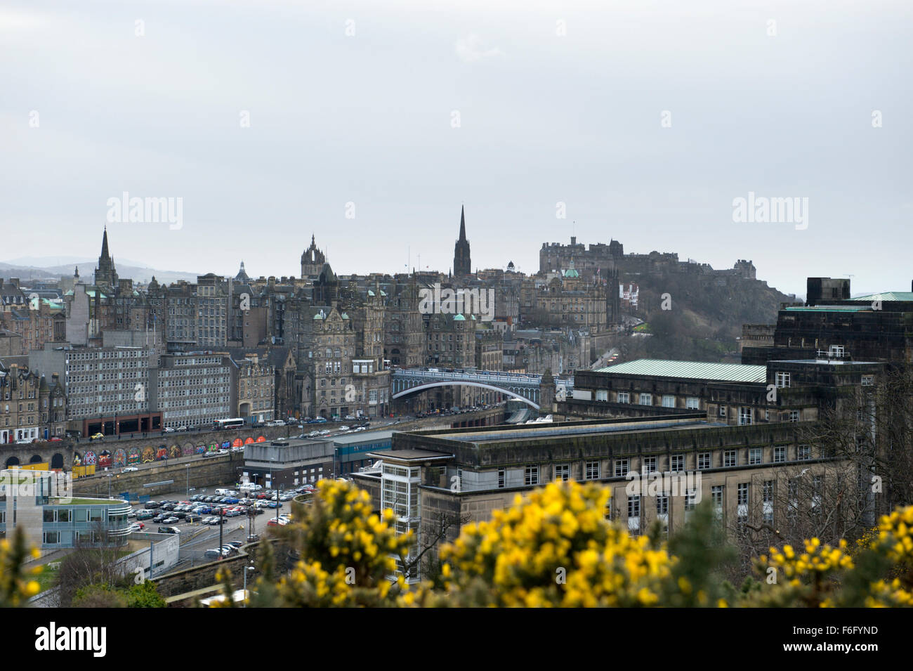 Looking across Waverley Station car park to Edinburgh Castle and Old Town cityscape beyond Stock Photo