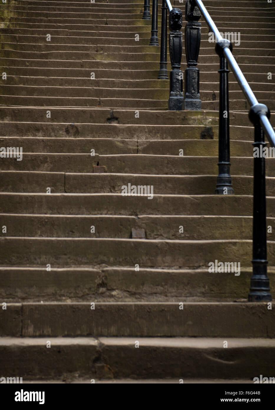 Stone steps and iron posts and rails leading to Calton Hill in Edinburgh Stock Photo