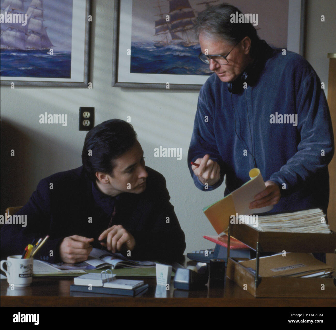 Mar 11, 1997; Los Angeles, CA, USA; Actor JOHN CUSACK as Martin Q.Blank with director GEORGE ARMITAGE  in 'Grosse Pointe Blanke.' Stock Photo