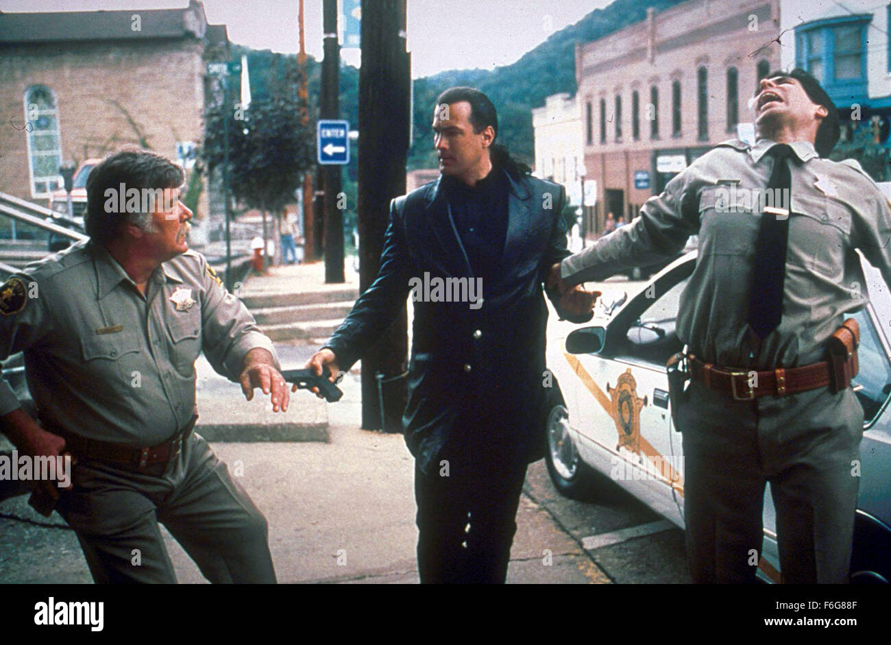 Sep 05, 1997; Hollywood, CA, USA; STEVEN SEAGAL (center) as Jack Taggart in the action, drama, thriller ''Fire Down Below'' directed by Felix Enrique Alcala. Stock Photo