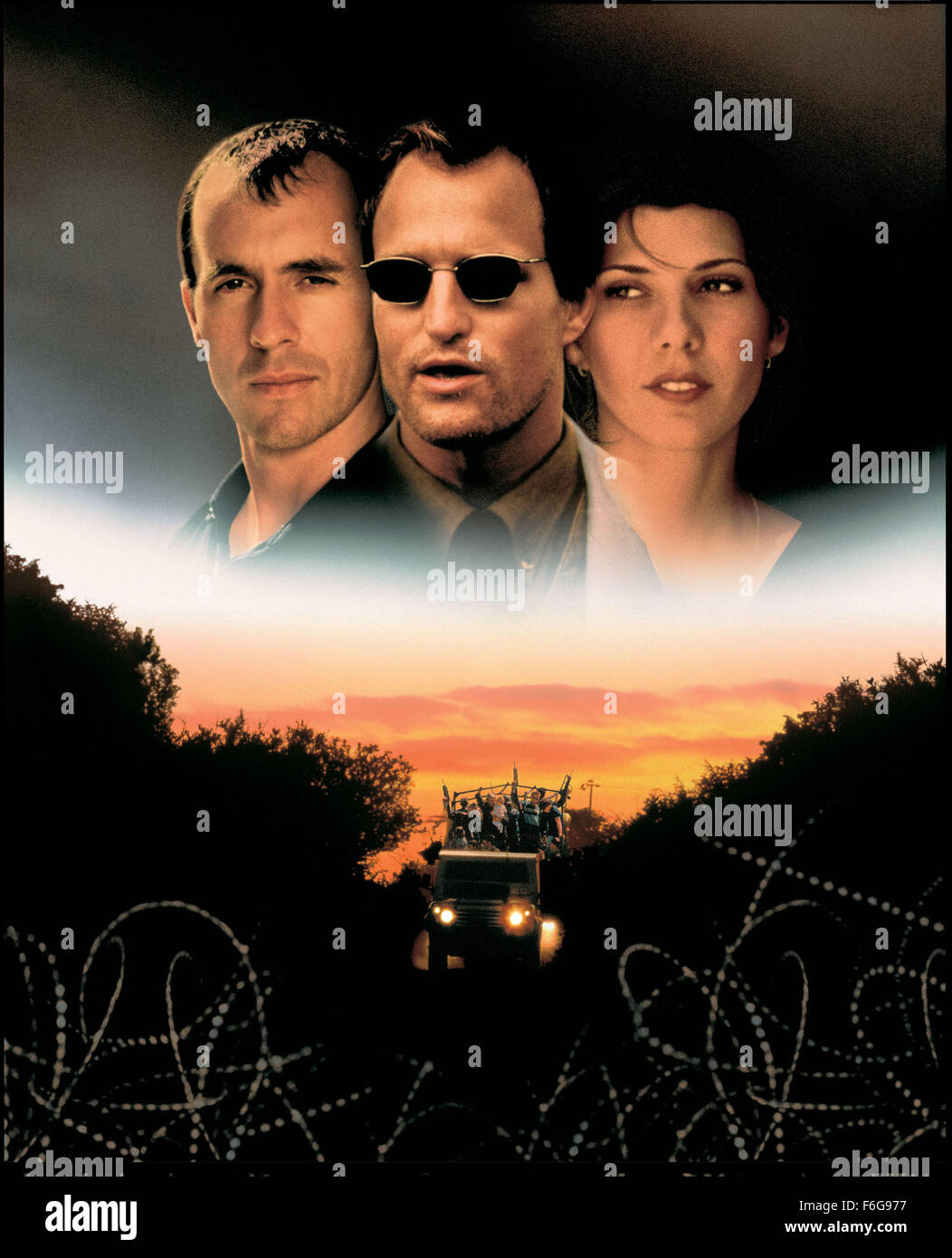 Nov 26, 1997; Los Angeles, CA, USA; Actor STEPHEN DILLANE as Michael Henderson, WOODY HARRELSON as Flynn and actress MARISA TOMEI as Nina in the Miramax war/drama, 'Welcome to Sarajevo.' Stock Photo