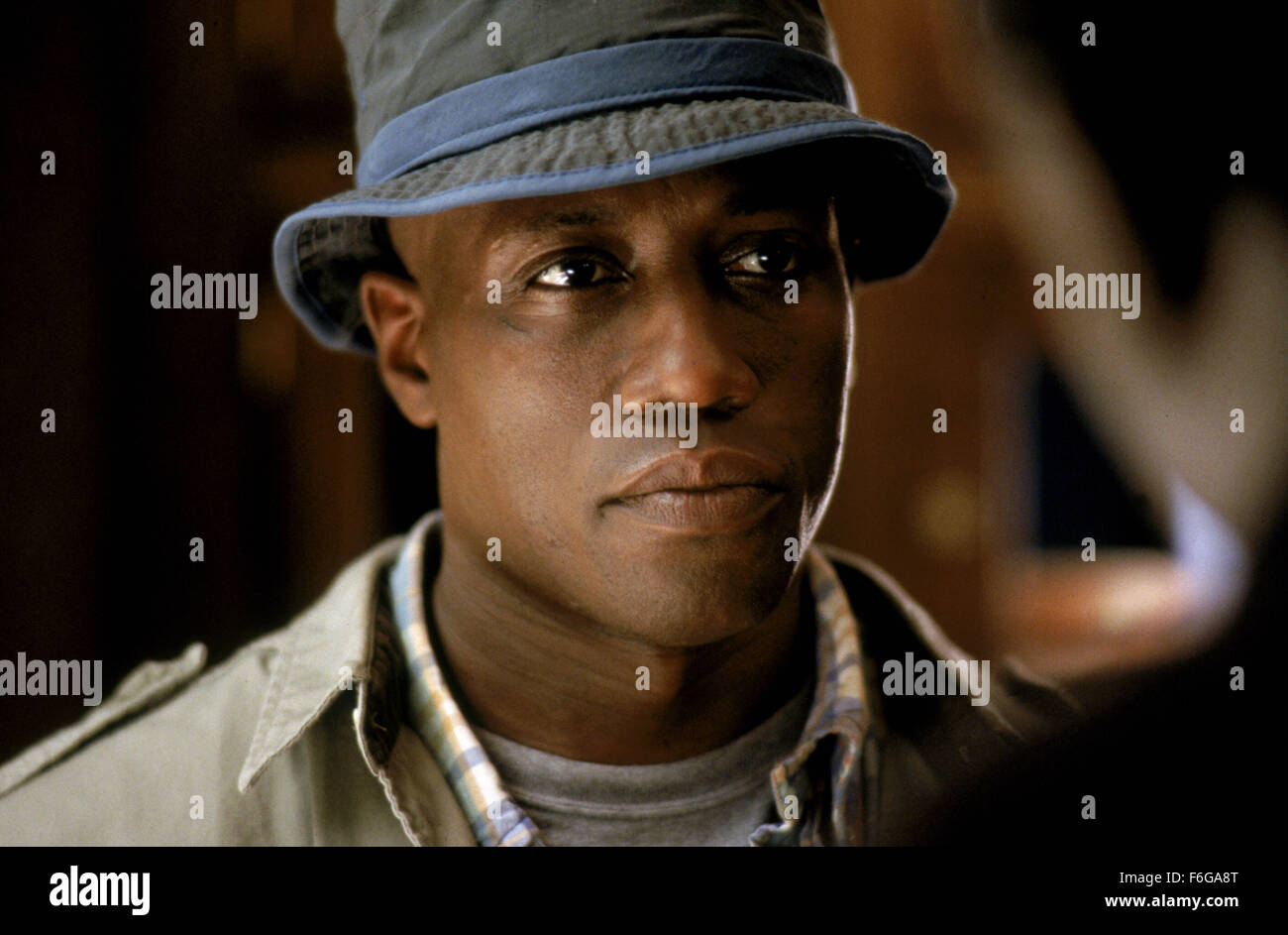 RELEASE DATE: 6 March 1998. MOVIE TITLE: U.S. Marshals STUDIO: Kopelson Entertainment. PLOT: US Marshal Samuel Gerard and his team of Marshals are assigned to track down Sheridan, a murderer and robber. PICTURED: WESLEY SNIPES as Mark J. Sheridan. Stock Photo