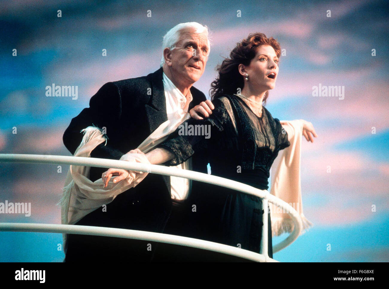 Jul 23, 1998; Los Angeles, CA, USA; Actor LESLIE NIELSEN stars as Ryan Harrison and MELINDA MCGRAW as Cass Lake in the Morgan Creek Productions comedy, 'Wrongfully Accused.' Directed by Pat Proft. Stock Photo