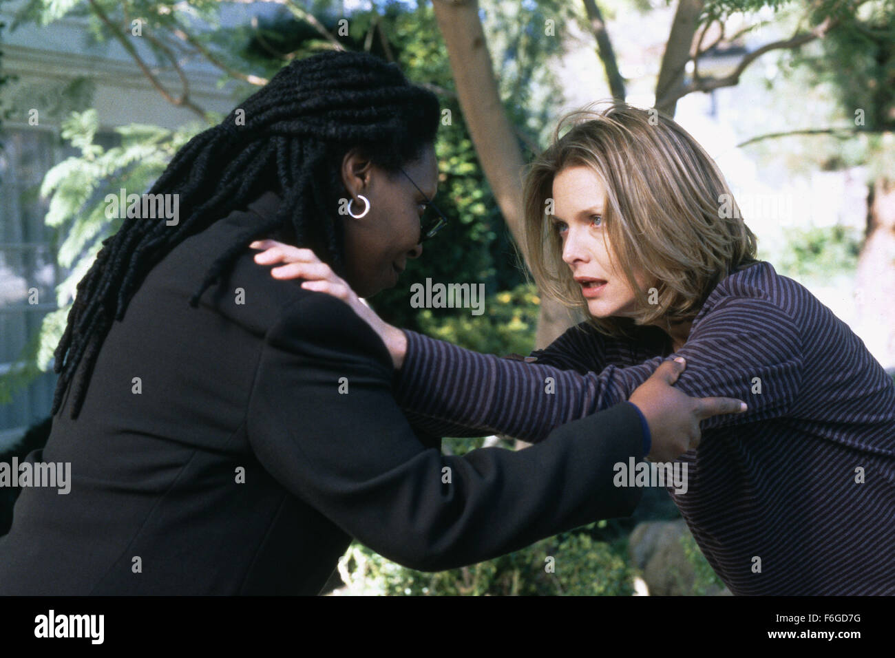 RELEASE DATE: March 12, 1999. MOVIE TITLE: The Deep End of the Ocean. STUDIO: Columbia Pictures Corporation. PLOT: The Deep End of The Ocean is a film about a family's reaction when Ben, the youngest son is kidnapped and then found ten years later, living in the same town. PICTURED: MICHELLE PFEIFFER as Beth Cappadora and WHOOPI GOLDBERG as Candy Bliss. Stock Photo