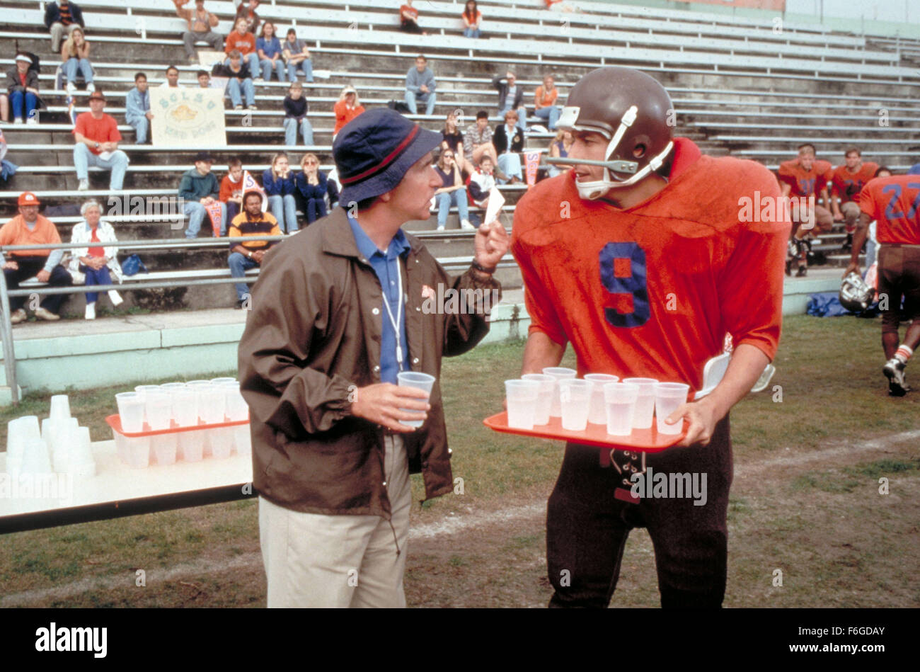 Nov 06, 1998; Orlando, FL, USA; HENRY WINKLER and ADAM SANDLER star as Coach Klein and Bobby Boucher in the comedy 'The Waterboy' directed by Frank Coraci. Stock Photo