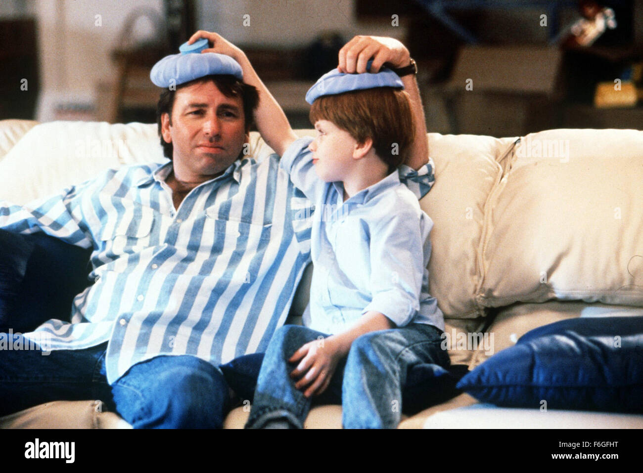 Jul 03, 1999; Hollywood, CA, USA; JOHN RITTER (left) as Ben Healy and MICHAEL OLIVER as Junior Healy in the comedy ''Problem Child 2'' directed by Brian Levant. Stock Photo