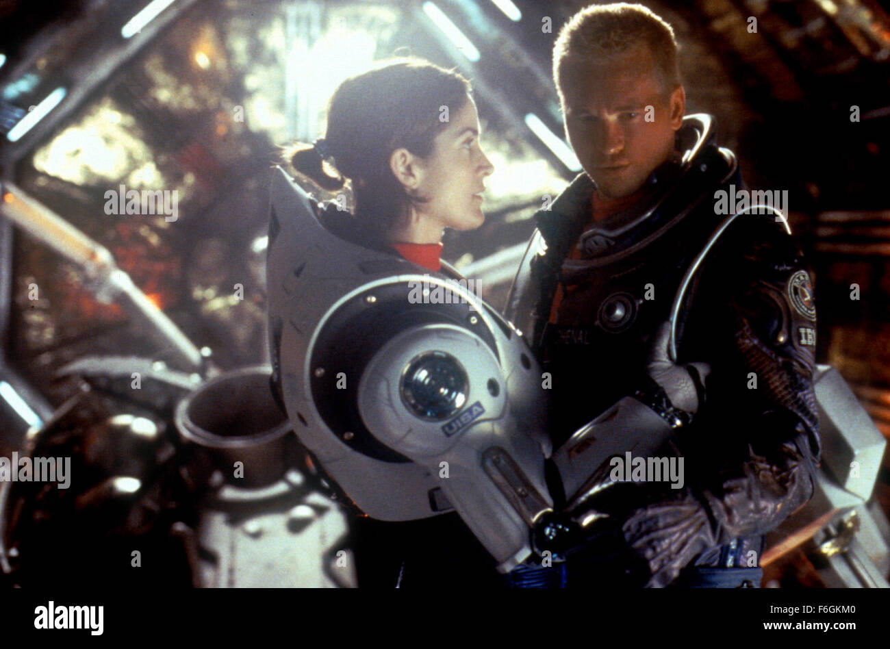 Nov 06, 2000; Sydney, AUSTRALIA; CARRIE-ANNE MOSS as Cmdr. Kate Bowman and VAL KILMER as Robby Gallagher in the sci-fi, action, thriller ''Red Planet'' directed by Anthony Hoffman. Stock Photo