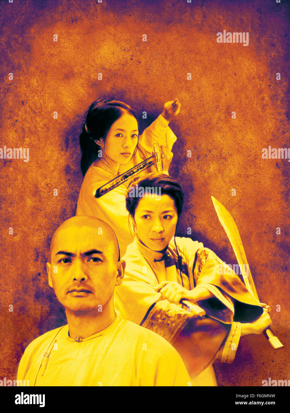 RELEASE DATE: December 22, 2000. MOVIE TITLE: Crouching Tiger Hidden Dragon. STUDIO: United China Vision. PLOT: The disappearance of a magical jade sword spurs a breathtaking quest for the missing treasure. Li is embittered by the loss of his jade sword, and his unrequited pursuit of Yu is further complicated by the mysterious intrusion of an assassin. The identity of the assassin is gradually unveiled as another poignant tale of love begins to ravel with that of Li and Yu against the backdrop of Western China's magnificent landscape. PICTURED: YUN-FAT CHOW as Master Li Mu Bai, MICHELLE YEOH a Stock Photo