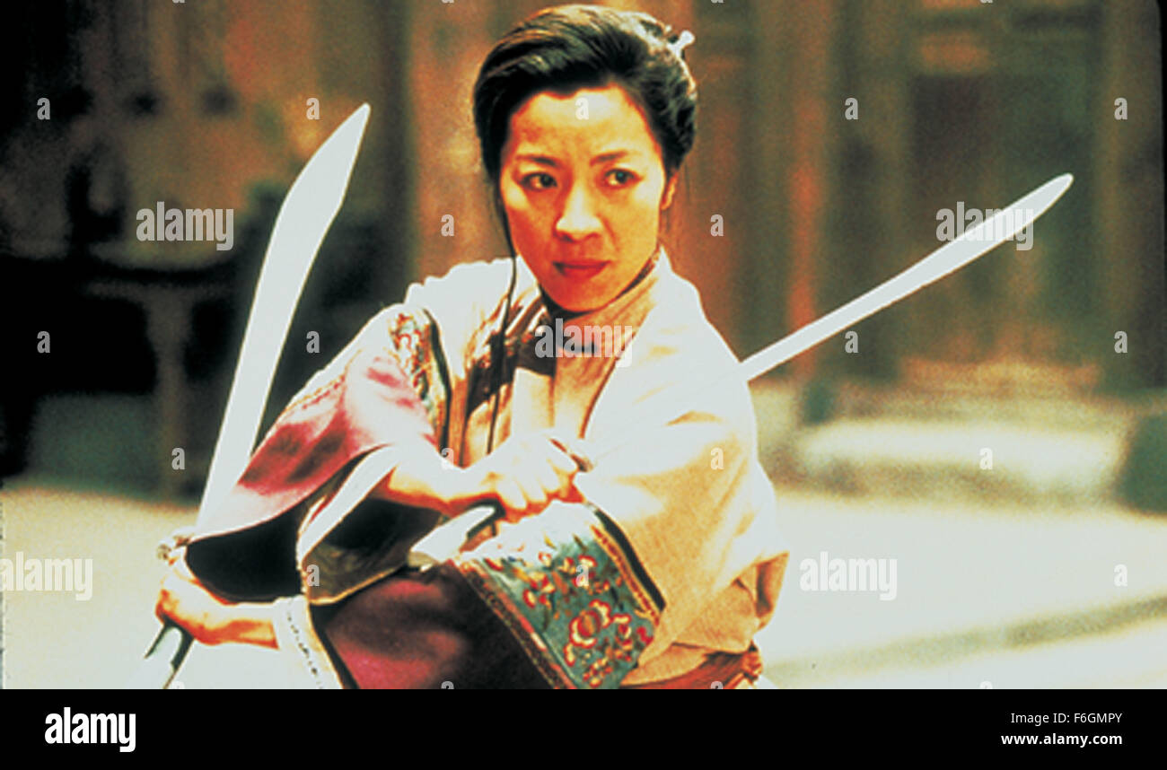 RELEASE DATE: December 22, 2000. MOVIE TITLE: Crouching Tiger Hidden Dragon. STUDIO: United China Vision. PLOT: The disappearance of a magical jade sword spurs a breathtaking quest for the missing treasure. Li is embittered by the loss of his jade sword, and his unrequited pursuit of Yu is further complicated by the mysterious intrusion of an assassin. The identity of the assassin is gradually unveiled as another poignant tale of love begins to ravel with that of Li and Yu against the backdrop of Western China's magnificent landscape. PICTURED: MICHELLE YEOH as Yu Shu Lien. Stock Photo