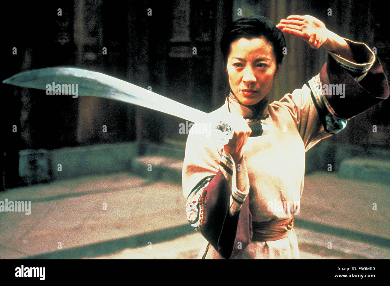 RELEASE DATE: December 22, 2000. MOVIE TITLE: Crouching Tiger Hidden Dragon. STUDIO: United China Vision. PLOT: The disappearance of a magical jade sword spurs a breathtaking quest for the missing treasure. Li is embittered by the loss of his jade sword, and his unrequited pursuit of Yu is further complicated by the mysterious intrusion of an assassin. The identity of the assassin is gradually unveiled as another poignant tale of love begins to ravel with that of Li and Yu against the backdrop of Western China's magnificent landscape. PICTURED: MICHELLE YEOH as Yu Shu Lien. Stock Photo