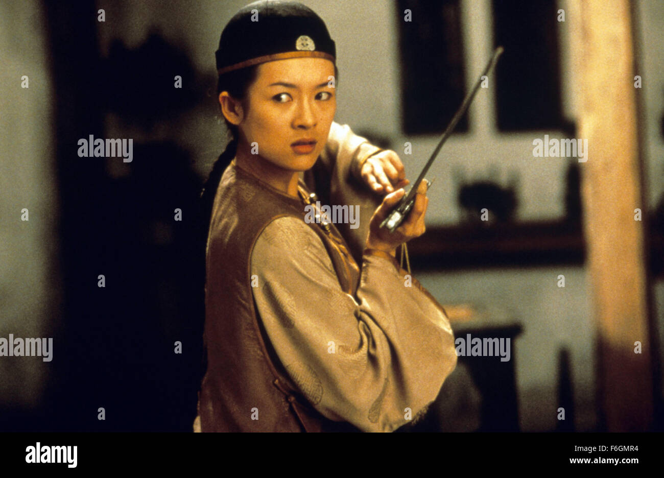 RELEASE DATE: December 22, 2000. MOVIE TITLE: Crouching Tiger Hidden Dragon. STUDIO: United China Vision. PLOT: The disappearance of a magical jade sword spurs a breathtaking quest for the missing treasure. Li is embittered by the loss of his jade sword, and his unrequited pursuit of Yu is further complicated by the mysterious intrusion of an assassin. The identity of the assassin is gradually unveiled as another poignant tale of love begins to ravel with that of Li and Yu against the backdrop of Western China's magnificent landscape. PICTURED: ZIYI ZHANG as Jen Yu. Stock Photo