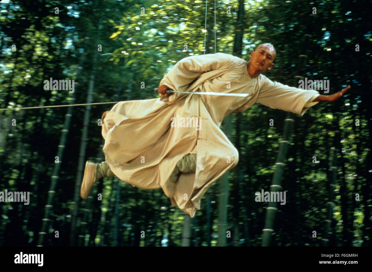 RELEASE DATE: December 22, 2000. MOVIE TITLE: Crouching Tiger Hidden Dragon. STUDIO: United China Vision. PLOT: The disappearance of a magical jade sword spurs a breathtaking quest for the missing treasure. Li is embittered by the loss of his jade sword, and his unrequited pursuit of Yu is further complicated by the mysterious intrusion of an assassin. The identity of the assassin is gradually unveiled as another poignant tale of love begins to ravel with that of Li and Yu against the backdrop of Western China's magnificent landscape. PICTURED: YUN-FAT CHOW as Master Li Mu Bai. Stock Photo