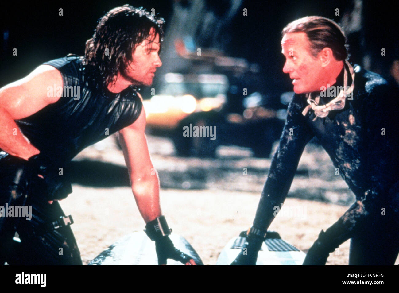 Jun 23, 2000; Los Angeles, CA, USA; (l-r) Actor KURT RUSSELL as Snake Plissken on his mission to save the City of Angels and Actor PETER FONDA as Pipeline a burnt-out surfer star in 'Escape From L.A.' directed by JOHN CARPENTER..  (Credit Image: ) Stock Photo