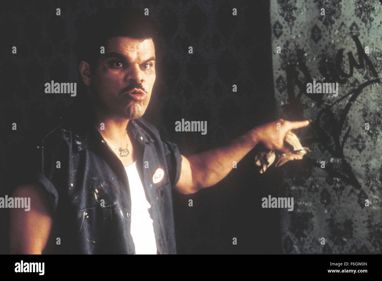 Mar 11, 2001; Hollywood, CA, USA; Actor LUIS GUZMAN as Juan Benitez stars in a scene of the comedy-drama 'Double Whammy' directed by Tom DiCillo. A world-weary police detective who fails to stop a fast food restaurant massace struggles to regain his reputation, public image and self-worth. Stock Photo