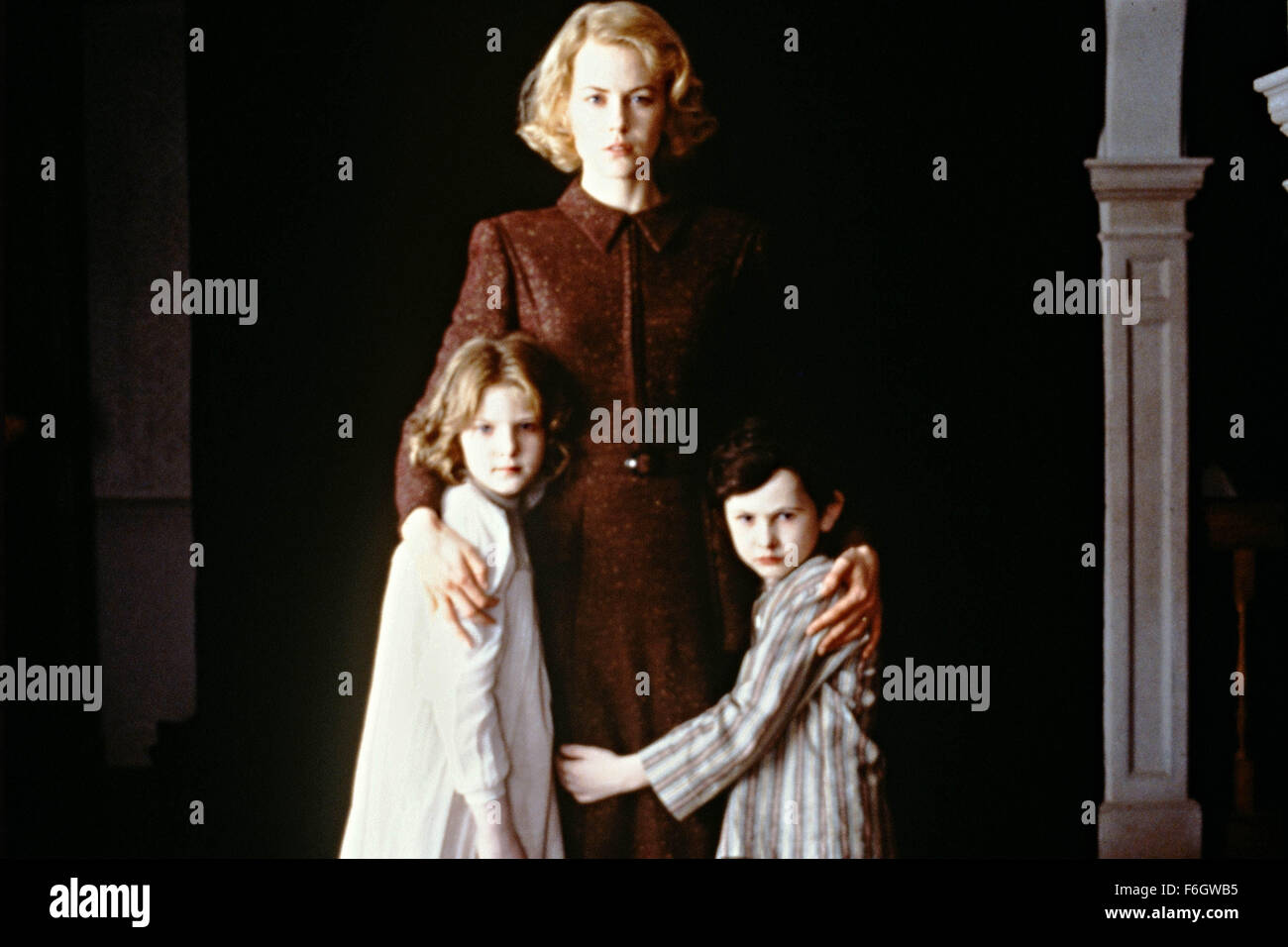 Aug 10, 2001; Los Angeles, CA, USA; Actres NICOLE KIDMAN stars as Grace Stewart in the Miramax thriller 'The Others.' Grace lives with her children ALAKINA MANN as Anne and JAMES BENTLEY as Nicholas, in a house that she is convinced is haunted. Stock Photo