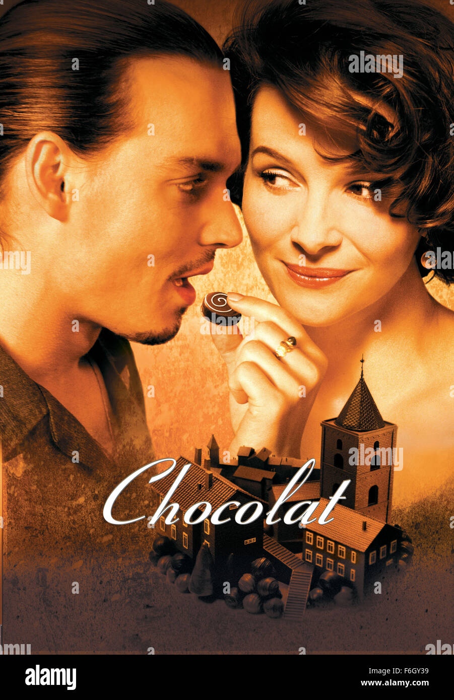 RELEASE DATE: January 5, 2001. MOVIE TITLE: Chocolate. STUDIO: Miramax Films. PLOT: When a single mother and her six-year-old daughter move to rural France and open a chocolate shop - with Sunday hours - across the street from the local church, they are met with some skepticism. But as soon as they coax the townspeople into enjoying their delicious products, they are warmly welcomed. PICTURED: JOHNNY DEPP as Roux and JULIETTE BINOCHE as Vianne. Stock Photo