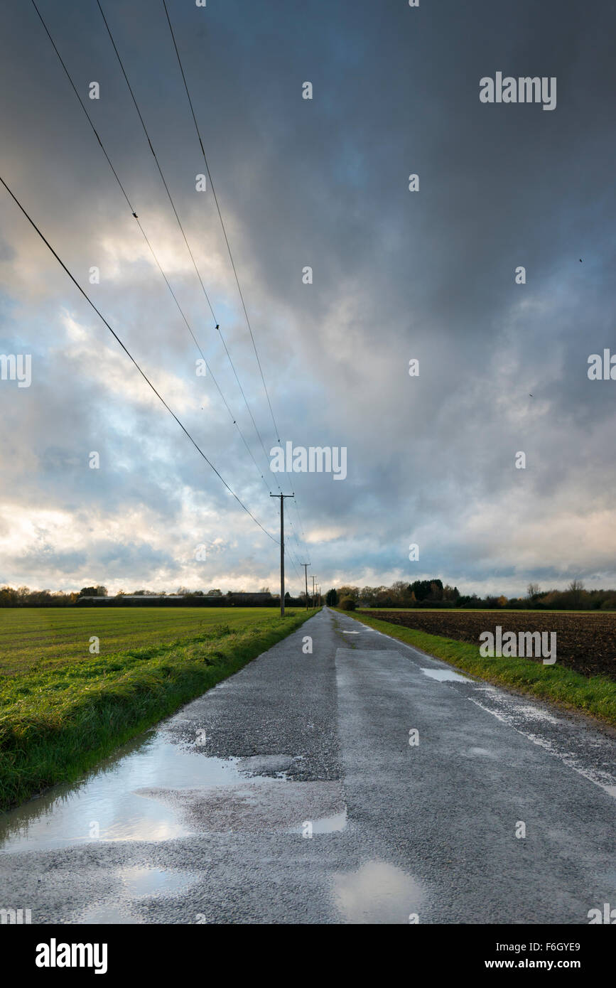 Cambridgeshire Fens, UK. 17th Nov 2015. Storm Barney fills the wide open skies of the Cambridgeshire Fens at Over, UK. As the weather system arrived in East Anglia clouds moved quickly across the sky and the wind began to whip up in the open landscape. The wind is due to pick up during this evening and overnight as the storm continues to move eastwards over the UK. Credit Julian Eales/Alamy Live News Stock Photo