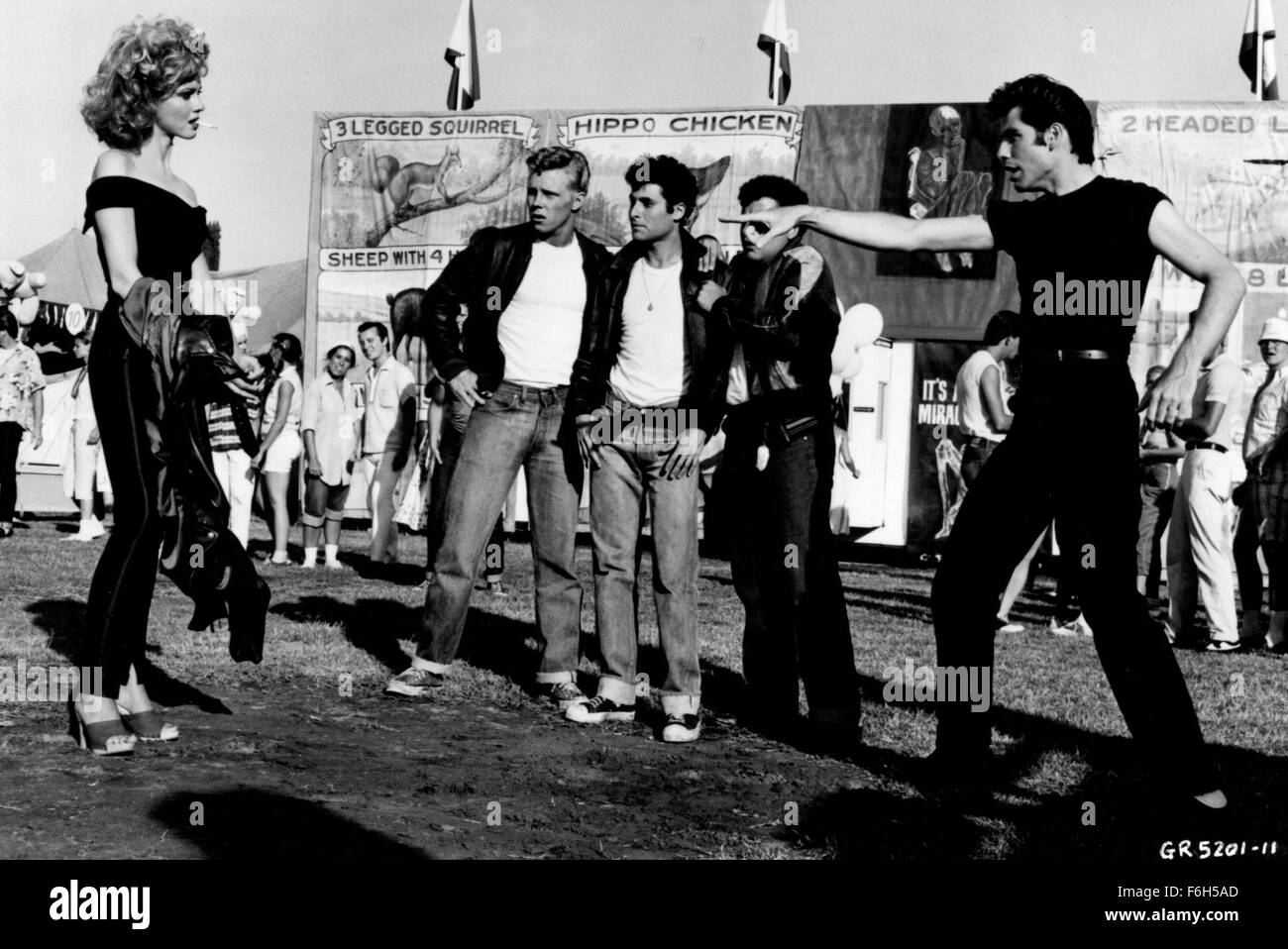 Jan 01, 2002; Hollywood, CA, USA; File Photo: 1988; Actors OLIVIA NEWTON-JOHN as Sandy, KELLY WARD as Putzie, MICHAEL TUCCI as Sonny, BARRY PEARL as Doody & JOHN TRAVOLTA as Danny in the movie 'Grease.'.  (Credit Image: ) Stock Photo