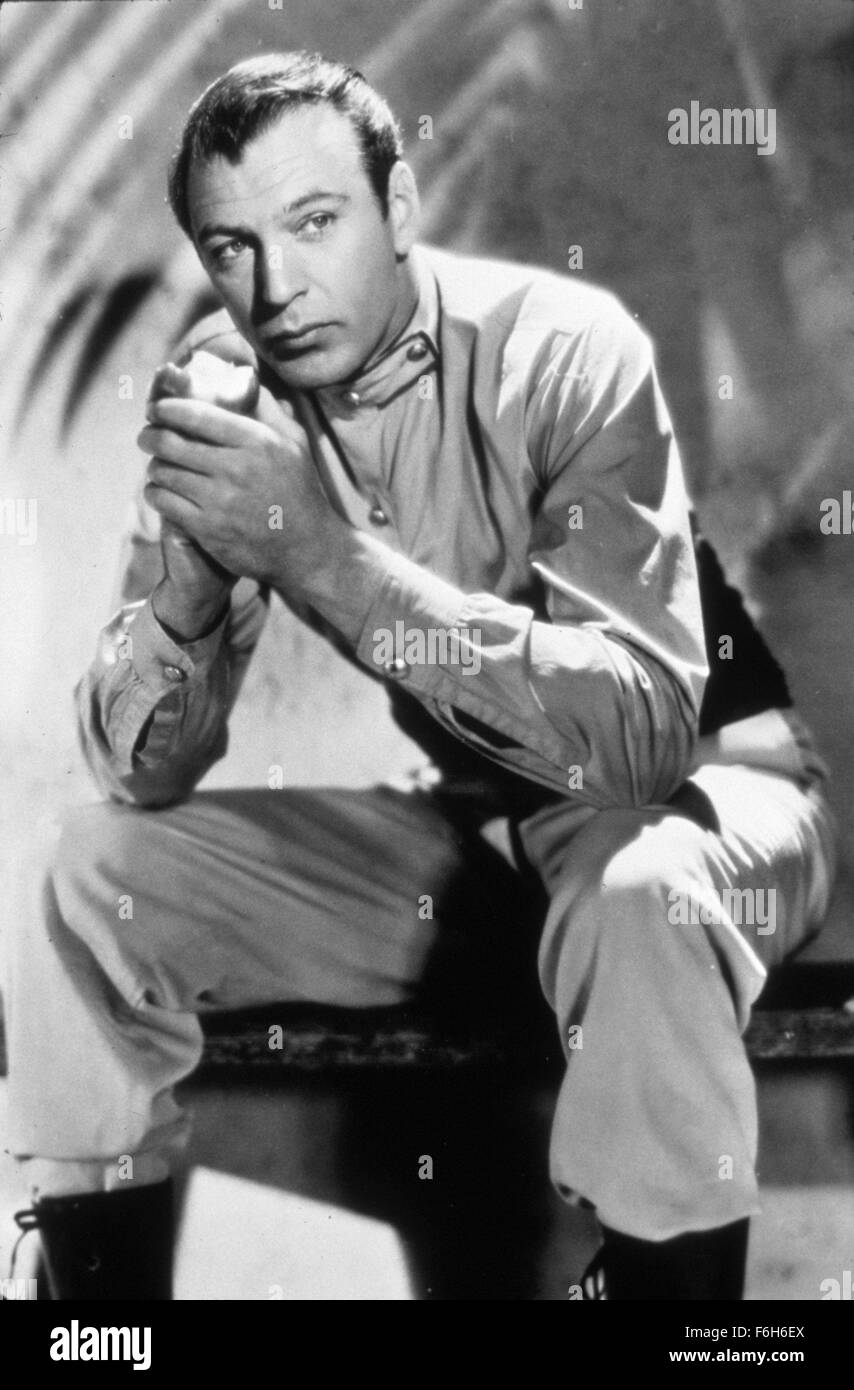1939, Film Title: BEAU GESTE, Director: WILLIAM WELLMAN, Studio: PARAMOUNT, Pictured: APPLE, CLOTHING, GARY COOPER, EATING, FOREIGN LEGION UNIFORM. (Credit Image: SNAP) Stock Photo