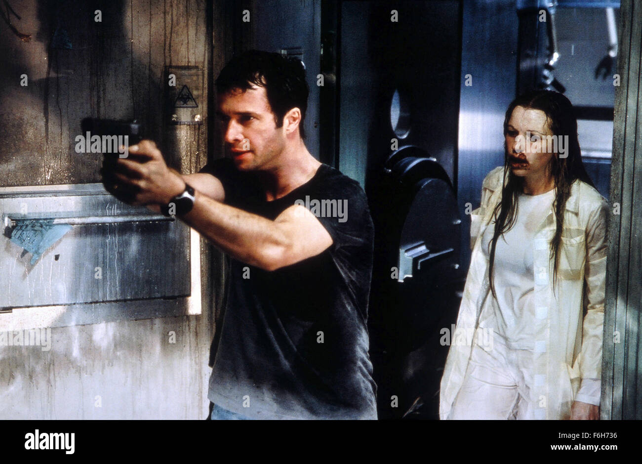 Mar 15, 2002; Paris, FRANCE; JAMES PUREFOY (left) as Spence Parks in the action, sci-fi, thriller ''Resident Evil'' directed by Paul W.S. Anderson. Stock Photo
