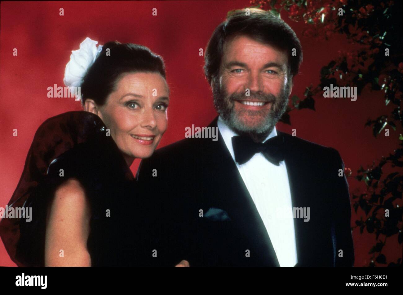 1987, Film Title: LOVE AMONG THIEVES, Director: ROGER YOUNG, Pictured: AUDREY HEPBURN, ROBERT WAGNER, TUXEDO, ARM IN ARM, BEARD, ROMANCE, WEALTHY. (Credit Image: SNAP) Stock Photo