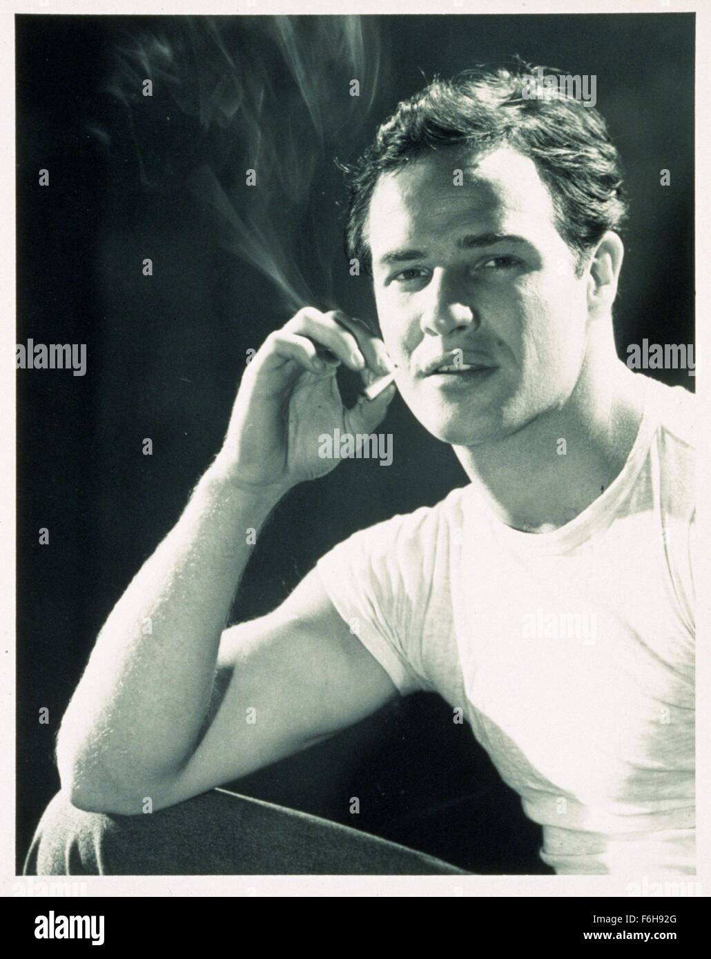 1954, Film Title: STREETCAR NAMED DESIRE, Pictured: T-SHIRT, 1954, MARLON BRANDO, CLOTHING, COLOR, SMOKERS, TEE SHIRT. (Credit Image: SNAP) Stock Photo