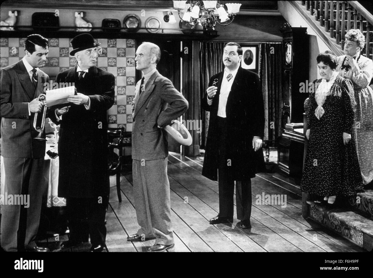 1944, Film Title: ARSENIC AND OLD LACE, Director: FRANK CAPRA, Studio: WARNER, Pictured: JEAN ADAIR, JOHN ALEXANDER, INTERIOR, ENSEMBLE, JAMES GLEASON, CARY GRANT, EDWARD EVERETT HORTON, JOSEPHINE HULL, TRUMPET, MURDER, SUSPECTS. (Credit Image: SNAP) Stock Photo