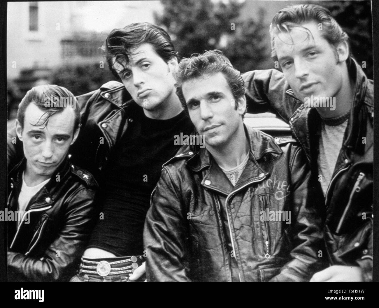 1973, Film Title: LORDS OF FLATBUSH, Pictured: PERRY KING, PAUL MACE, SYLVESTER STALLONE, HENRY WINKLER, GANG, LEATHER JACKET, HAIR - SLICK, HAIR - GREASY, TOUGH GUY, BEEFCAKE. (Credit Image: SNAP) Stock Photo