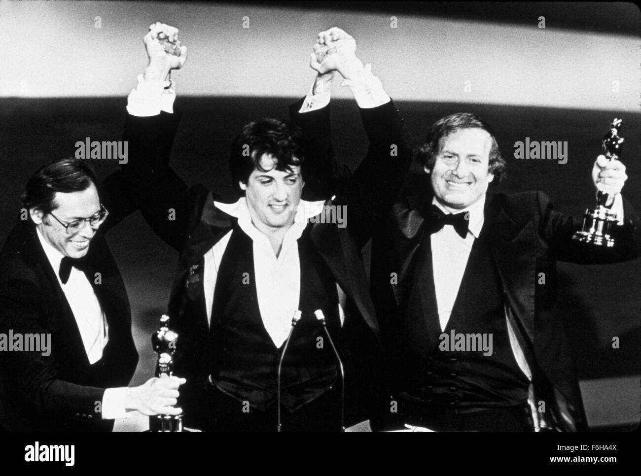 1976, Film Title: ROCKY, Pictured: 1976, ACADEMY AWARDS CEREMONIES, ACCESSORIES, AWARDS - ACADEMY, BEST PICTURE, ROBERT CHARTOFF, DOROTHY CHANDLER PAVILION, OSCAR (ACADEMY AWARD STATUE), SYLVESTER STALLONE, IRWIN WINKLER, OSCAR RETRO. (Credit Image: SNAP) (Credit Image: c SNAP/Entertainment Pictures) Stock Photo