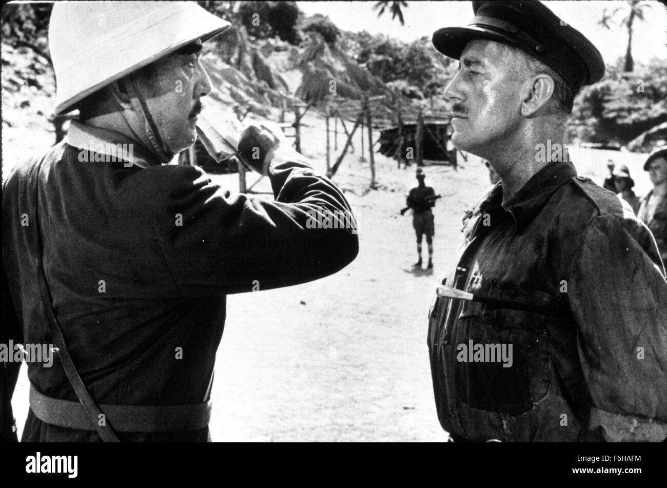 1957, Film Title: BRIDGE ON THE RIVER KWAI, Director: DAVID LEAN, Pictured: 1957, AWARDS - ACADEMY, BEST ACTOR, ALEC GUINNESS, SESSUE HAYAKAWA, INSOLENT, HATE, COMMANDING, ORDER, ATTENTION, ANGRY, MILITARY, UNIFORM, SAND, OUTDOORS, OUTSIDE, SUNNY, BEACH, OSCAR RETRO, OSCAR (MOVIE), INSOLENCE, DEFIANCE, HATRED. (Credit Image: SNAP) Stock Photo