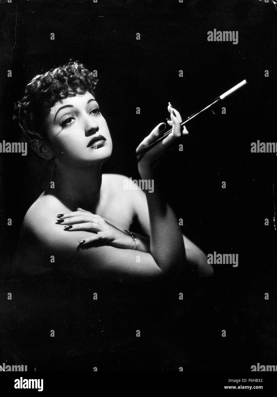 Cigarette holder Black and White Stock Photos & Images - Alamy