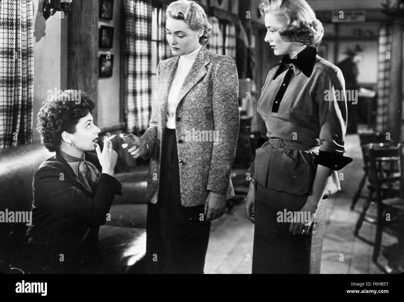 1950, Film Title: THREE SECRETS, Director: ROBERT WISE, Studio: WARNER, Pictured: ACCESSORIES, CIGARETTE, PATRICIA NEAL, ELEANOR PARKER, RUTH ROMAN, SMOKERS. (Credit Image: SNAP) Stock Photo
