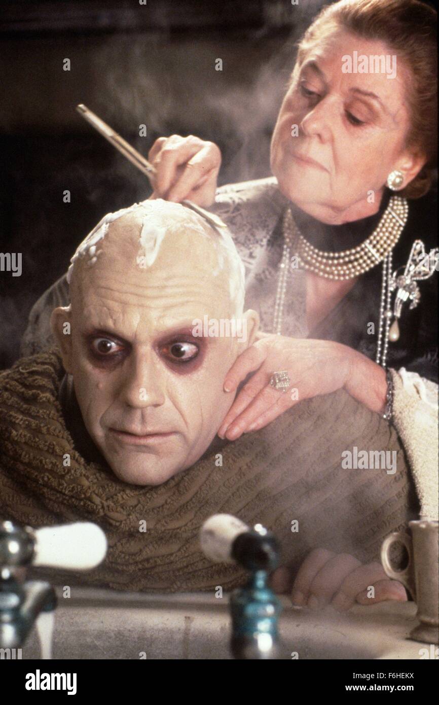 1991, Film Title: ADDAMS FAMILY, Director: BARRY SONNENFELD, Studio: ORION, Pictured: CHRISTOPHER LLOYD, JUDITH MALINA, SHAVING. (Credit Image: SNAP) Stock Photo
