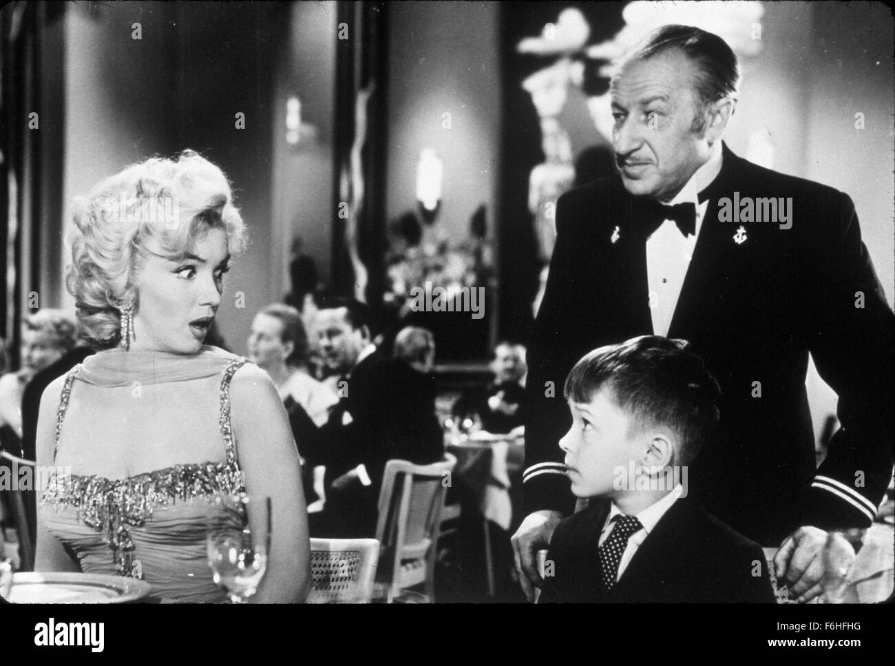 1953, Film Title: GENTLEMEN PREFER BLONDES, Director: HOWARD HAWKS, Studio: FOX, Pictured: BOY, MARILYN MONROE, GEORGE WINSLOW, KID, CHILD, HORRIFIED, SHOCKED, OFFENDED, DINING. (Credit Image: SNAP) Stock Photo