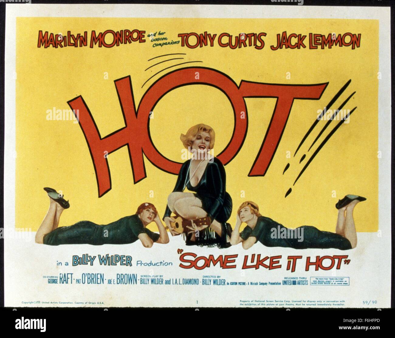 1959, Film Title: SOME LIKE IT HOT, Director: BILLY WILDER, Studio: UA, Pictured: CLOTHING, TONY CURTIS, DRAG, JACK LEMMON, MARILYN MONROE, BILLY WILDER, GIRL BAND, GENDER BENDER, DISGUISE, MASQUERADE, MIMICRY, SQUATTING. (Credit Image: SNAP) Stock Photo