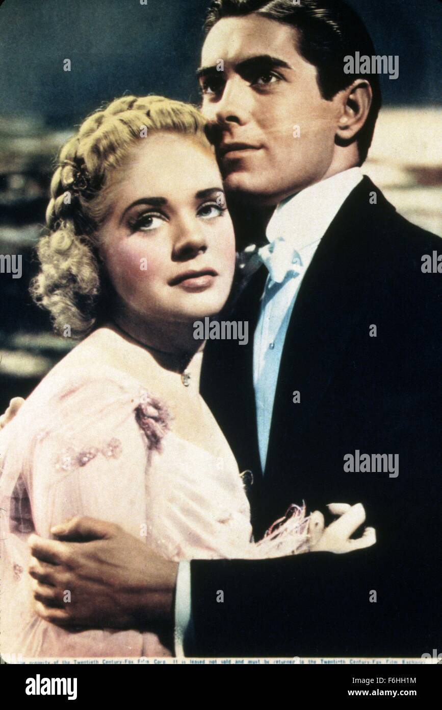 1938, Film Title: ALEXANDER'S RAGTIME BAND, Director: HENRY KING, Studio: FOX, Pictured: ALICE FAYE, TUXEDO, TYRONE POWER, EMBRACE, PROTECTIVE, LOOKING UP, ROMANCE, DAY DREAMING. (Credit Image: SNAP) Stock Photo