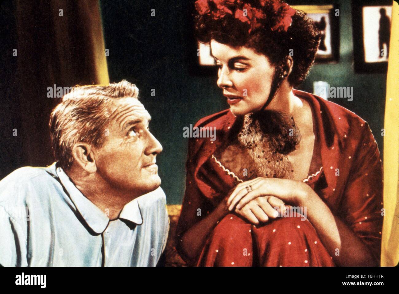 1949, Film Title: ADAM'S RIB, Director: GEORGE CUKOR, Studio: MGM, Pictured: GAZE, KATHARINE HEPBURN, SPENCER TRACY, SITTING, CASUAL, HAT, HANDS IN LAP. (Credit Image: SNAP) Stock Photo