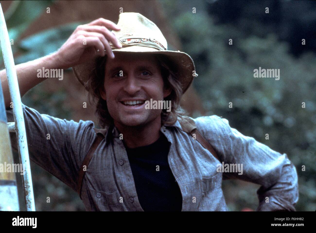 RELEASE DATE: March 30, 1984  MOVIE TITLE: Romancing the Stone  DIRECTOR: Robert Zemeckis  STUDIO: 20th Century Fox  PLOT: A romance writer sets off to Colombia to ransom her kidnapped sister, and soon finds herself in the middle of a dangerous adventure  PICTURED: MICHAEL DOUGLAS as Jack Colton  (Credit Image: c 20th Century Fox/Entertainment Pictures) Stock Photo