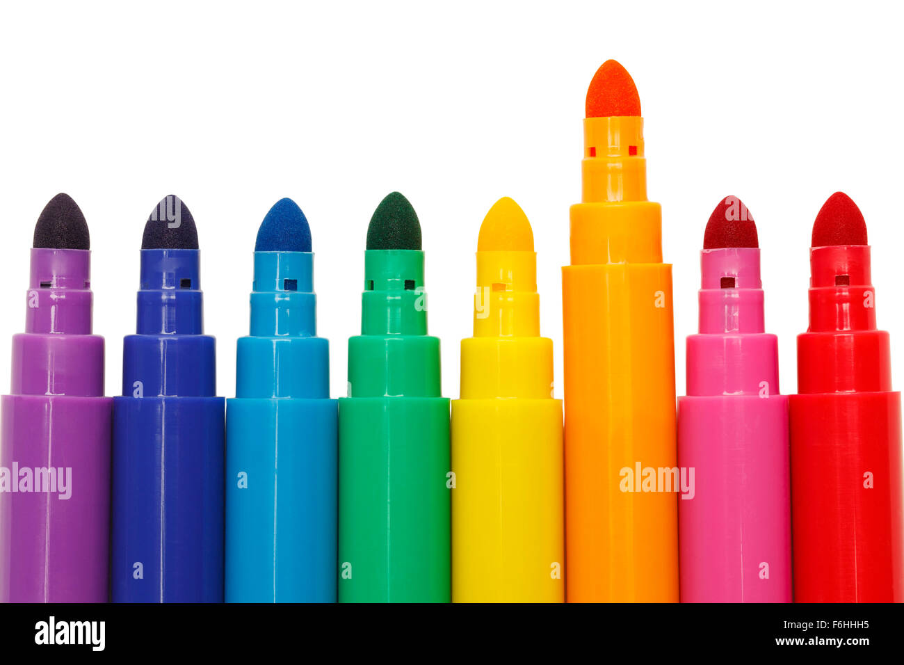 Markers with One Sticking Up Isolated on a White Background. Stock Photo