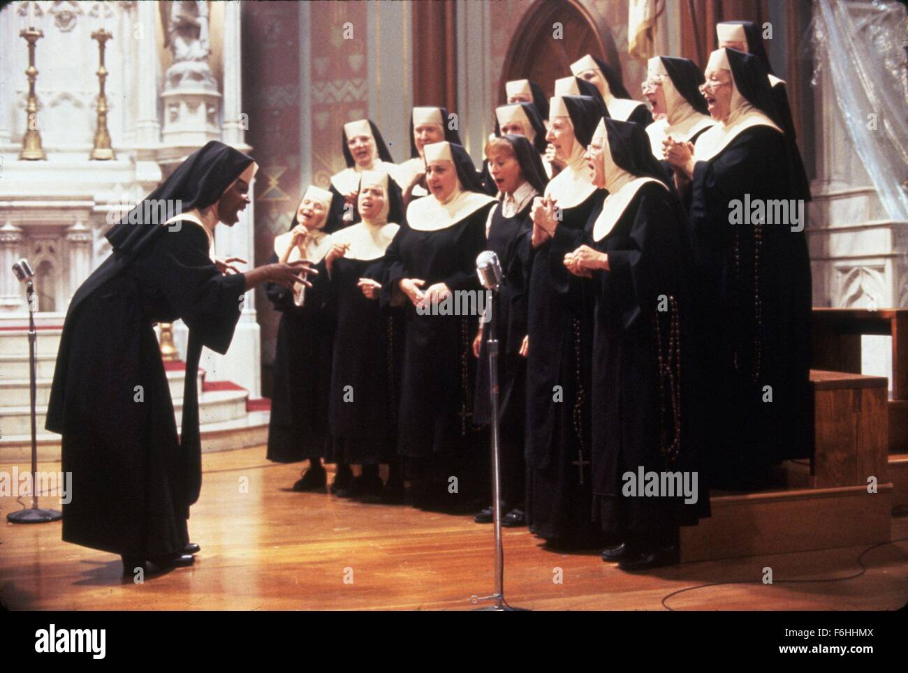 1992, Film Title: SISTER ACT, Director: EMILE ARDOLINO, Studio: TOUCHSTONE, Pictured: EMILE ARDOLINO, CLOTHING, ENSEMBLE, WHOOPI GOLDBERG. (Credit Image: SNAP) Stock Photo