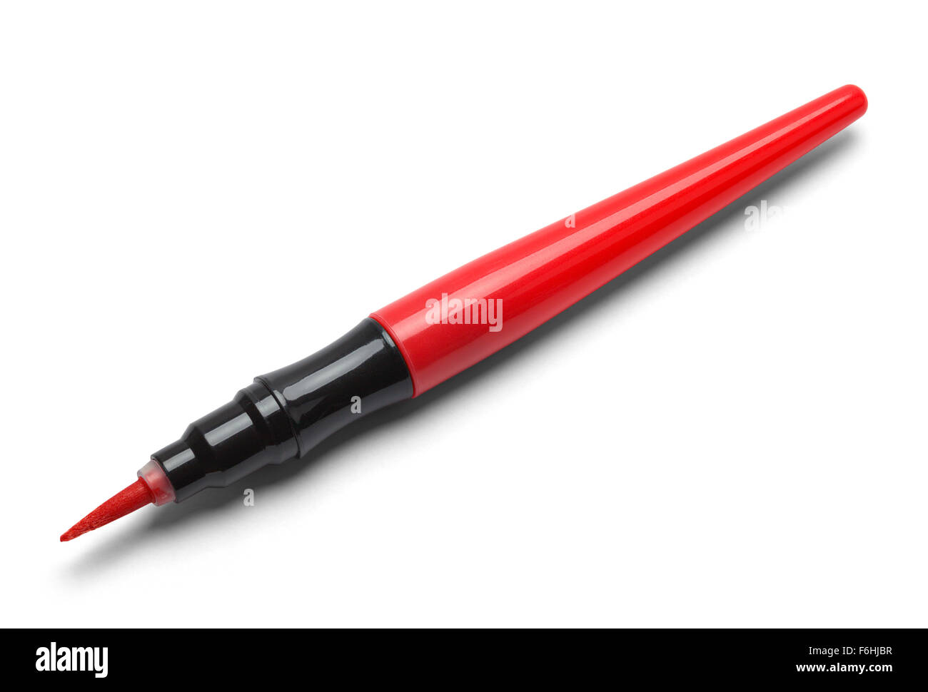 Single Red Paint Marker Isolated on a White Background. Stock Photo