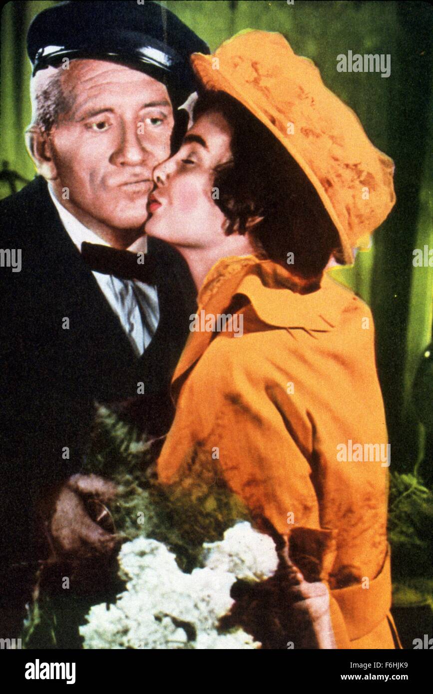 1953, Film Title: ACTRESS, Director: GEORGE CUKOR, Studio: MGM, Pictured: FLOWERS, JEAN SIMMONS, SPENCER TRACY, KISSING, ROMANCE, RUTH GORDON, FATHER, AMBITIOUS, GRATEFUL, HAT. (Credit Image: SNAP) Stock Photo