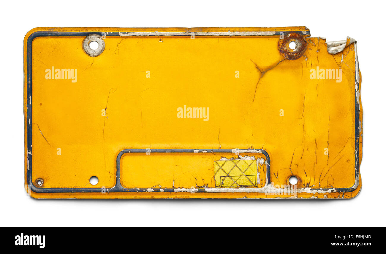 Old Yellow License Plate with Copy Space Isolated on a White Background. Stock Photo