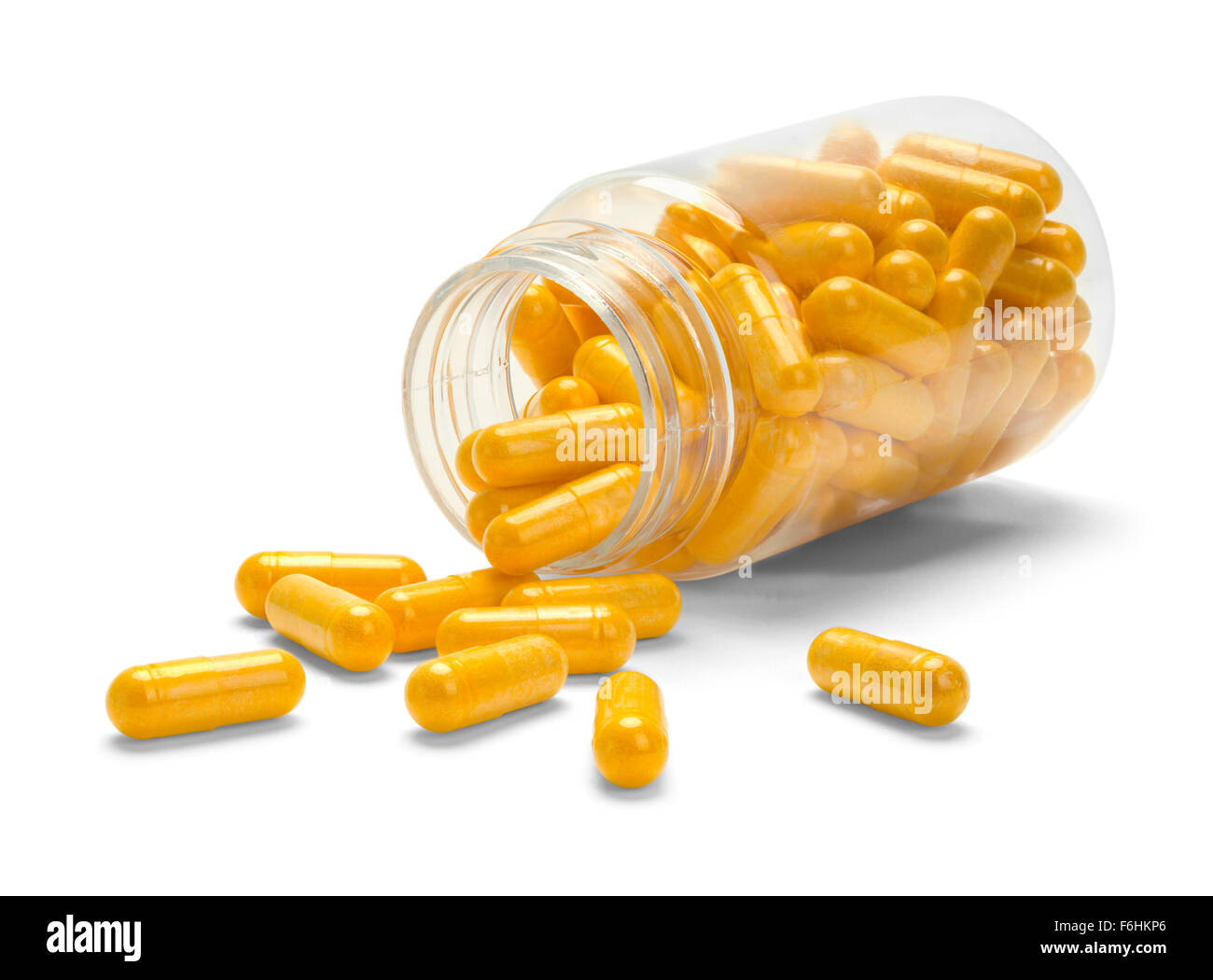 Bottle of Medicine Pills Open and Tipped Over Isolated on a White Background. Stock Photo
