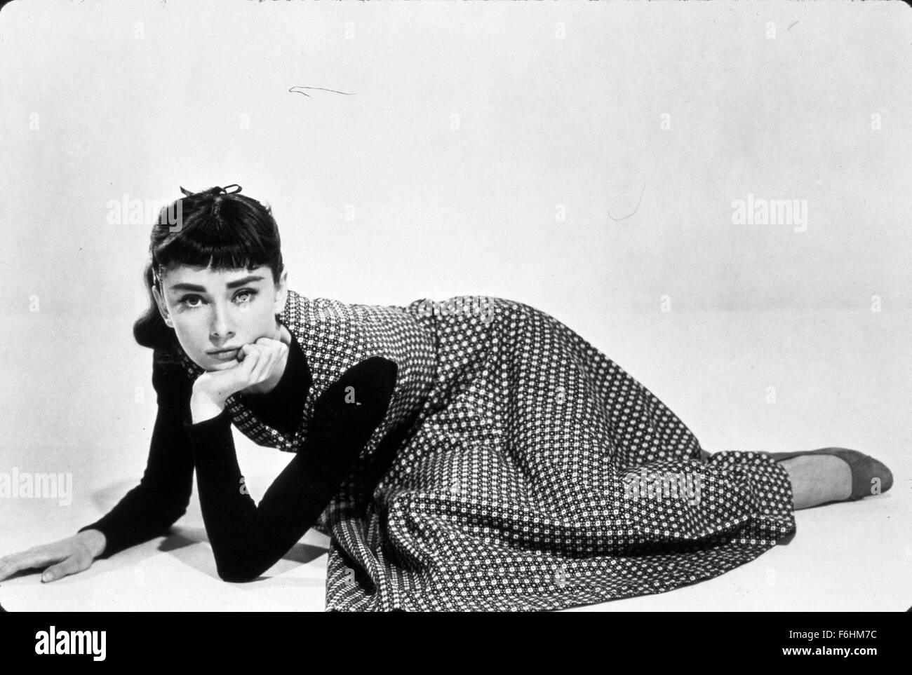 1954, Film Title: SABRINA, Director: BILLY WILDER, Pictured: AUDREY HEPBURN, RECLINING, LYING, FRINGE, PORTRAIT. (Credit Image: SNAP) Stock Photo