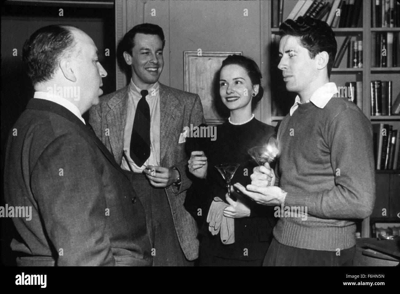 1948, Film Title: ROPE, Director: ALFRED HITCHCOCK, Studio: WARNER, Pictured: JOAN CHANDLER, JOHN DALL, FARLEY GRANGER, ALFRED HITCHCOCK. (Credit Image: SNAP) Stock Photo